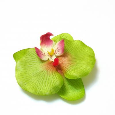 Зеленые головки искусственных орхидей