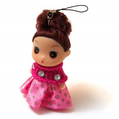 Маленькая куколка в розовом платье