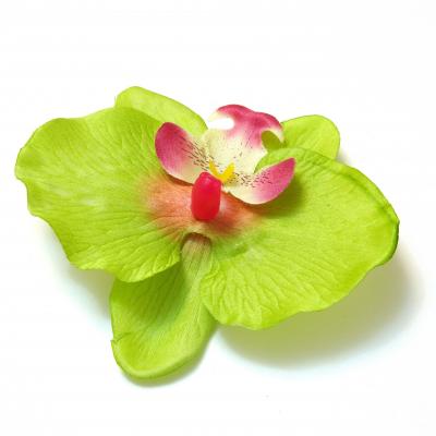 Зеленая головка орхидеи из ткани