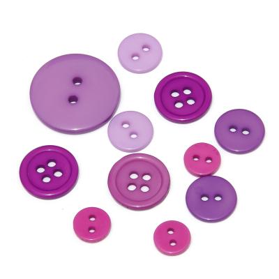 Пуговицы фиолетовые пластиковые